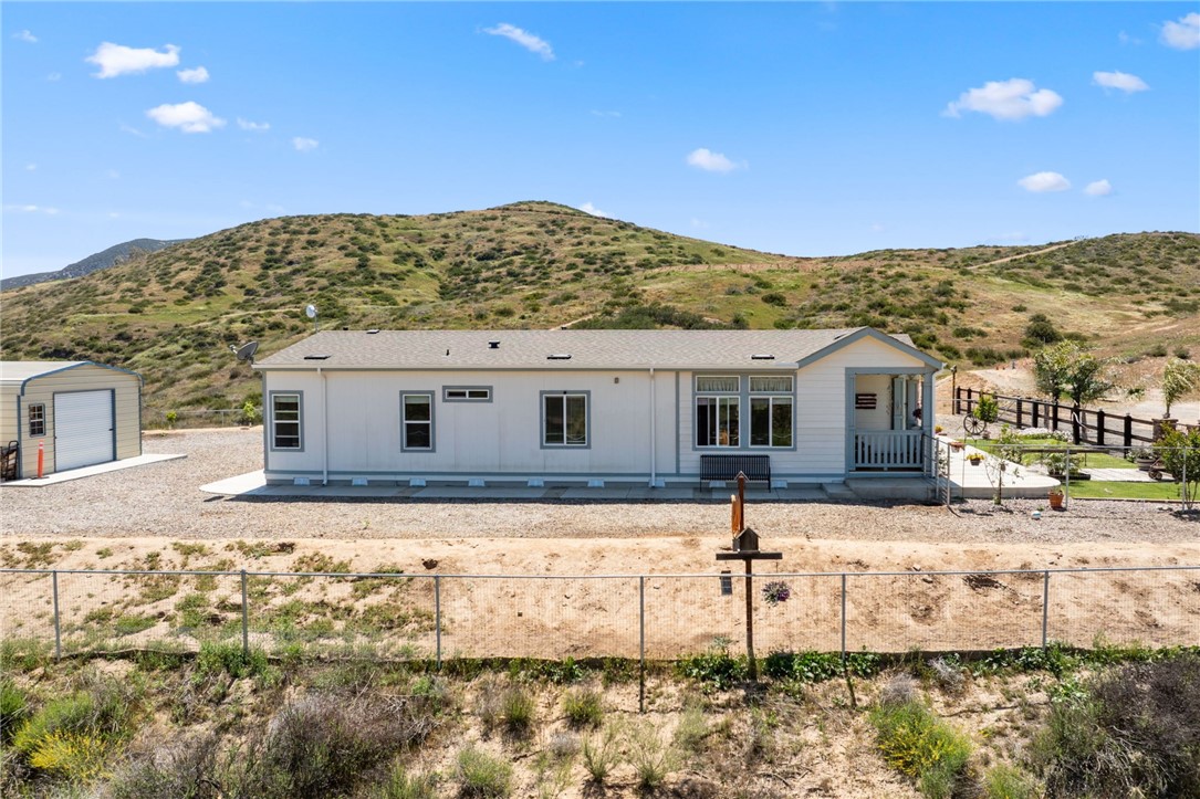 46430 De Portola Road Temecula, CA 92592 - Photo 48 of 61 a view of a house with a snow in the yard