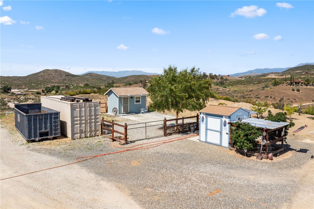 46430 De Portola Road Temecula, CA 92592 - Photo 53 of 61 a view of a terrace with a bench and mountain view