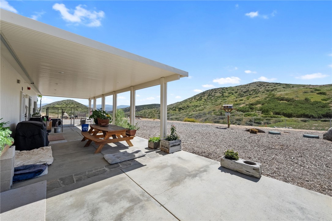 46430 De Portola Road Temecula, CA 92592 - Photo 55 of 61 a outdoor space with patio lots of furniture and garden