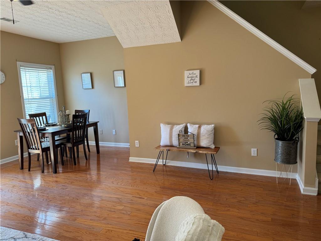 801 Old Peachtree Road Northwest, Unit 8 Lawrenceville, GA 30043 - Photo 2 of 26 a living room with furniture