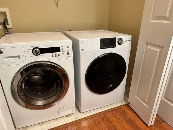 a utility room with dryer and washer