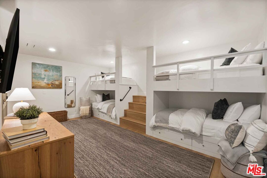 27643 West Shore Road, Unit 2 Lake Arrowhead, CA 92352 - Photo 25 of 31 a living room with furniture and a fireplace