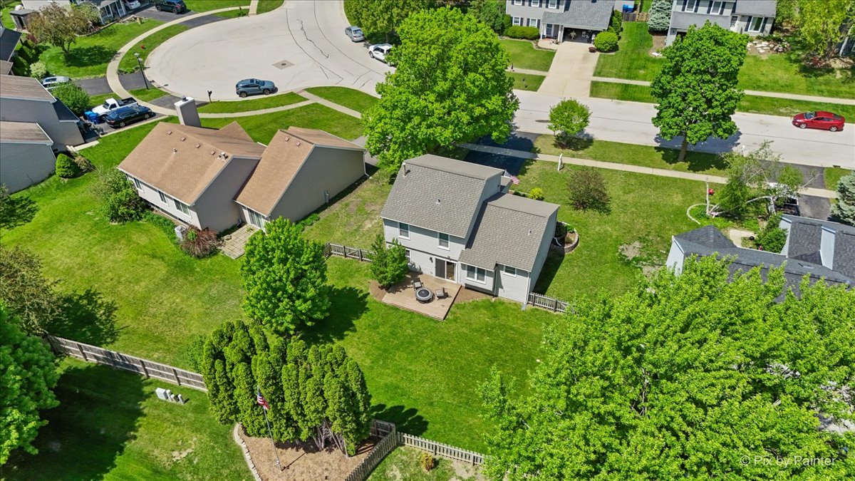 1150 Appleton Lane Geneva, IL 60134 - Photo 25 of 43 an aerial view of a house with a garden and swimming pool