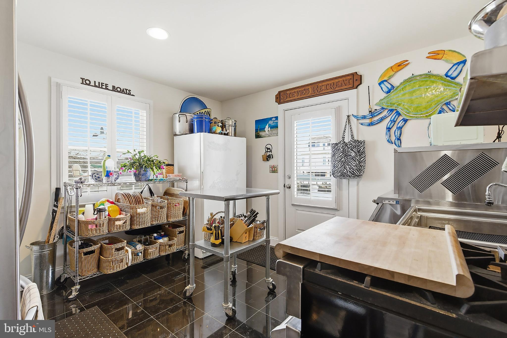 33 Sands Point Road Waretown, NJ 08758 - Photo 14 of 79 Bright coastal kitchen with playful decor.