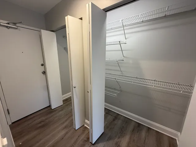 a bathroom with a glass shower door