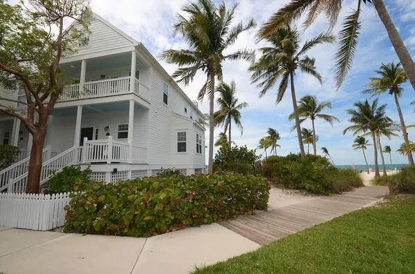 a view of a swimming pool with a table and chairs