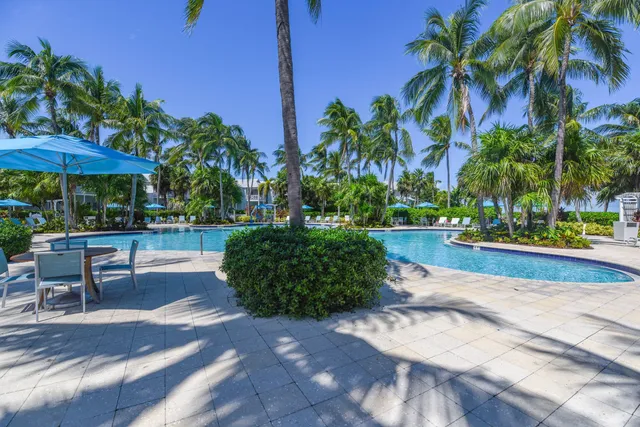 a view of a park with houses