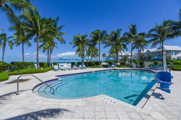 a view of multiple houses with a yard