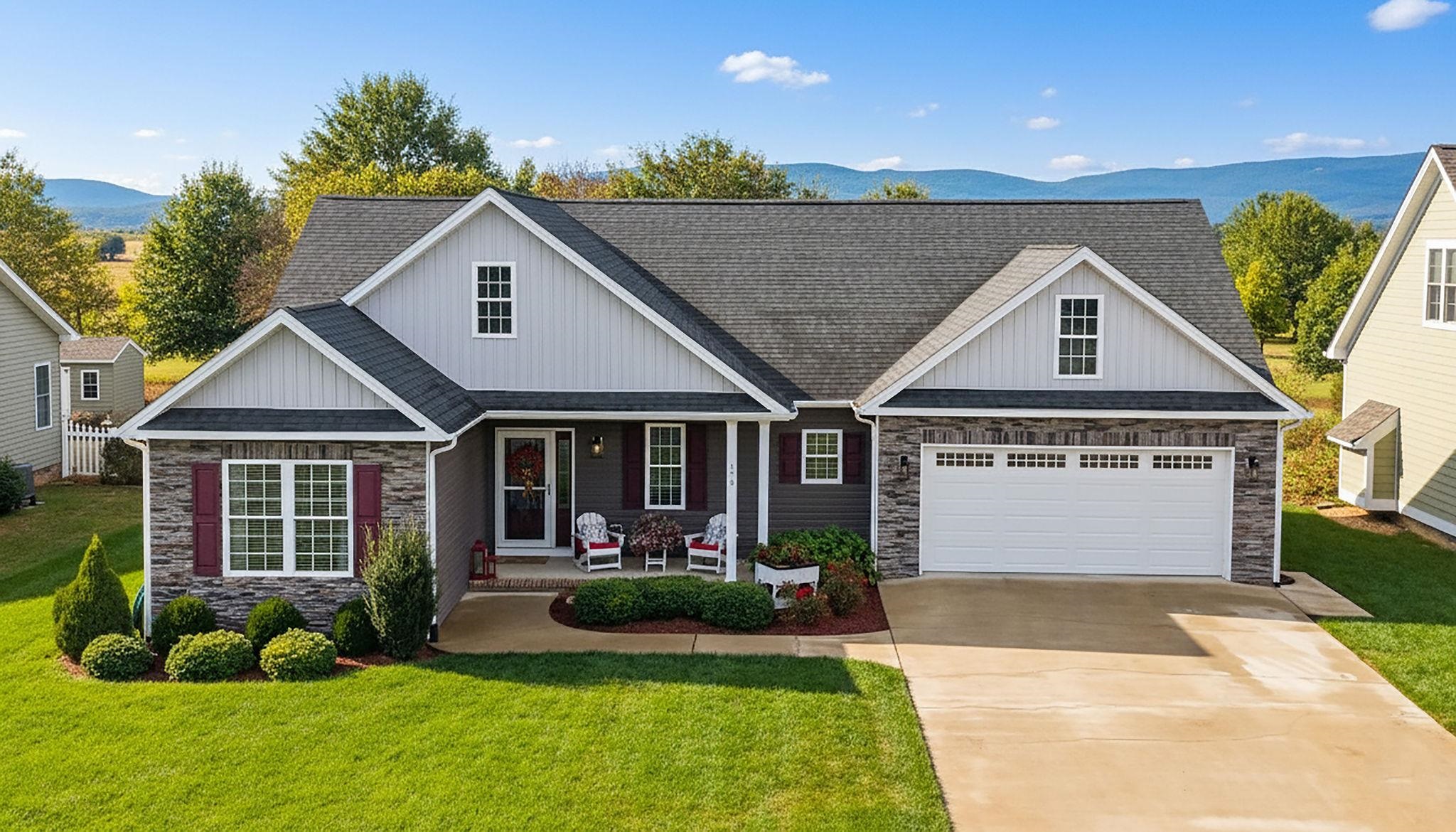front view of a house with a yard