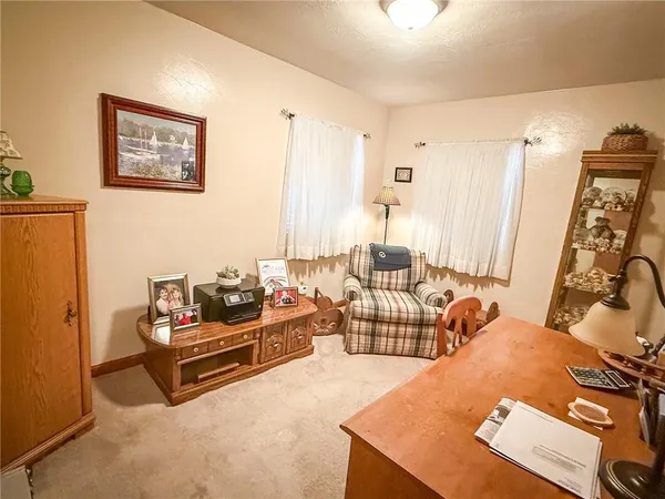 a living room with furniture and a couch