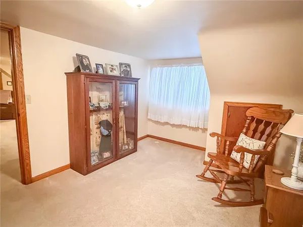 a room with furniture and a chair