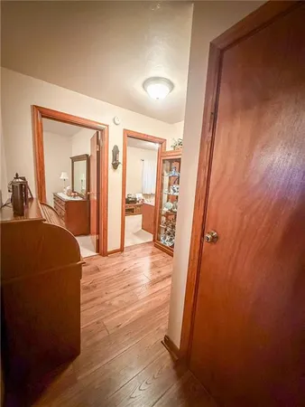 a bathroom with a shower and a sink