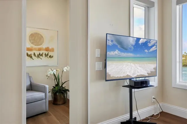 a spacious bathroom with a tub sink shower and mirror