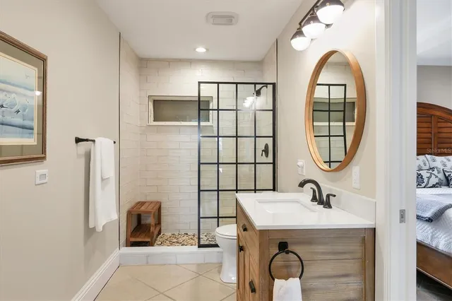 a front view of a house with yard and green space