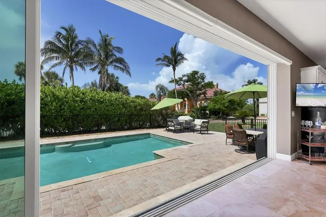 an aerial view of multiple houses with outdoor space