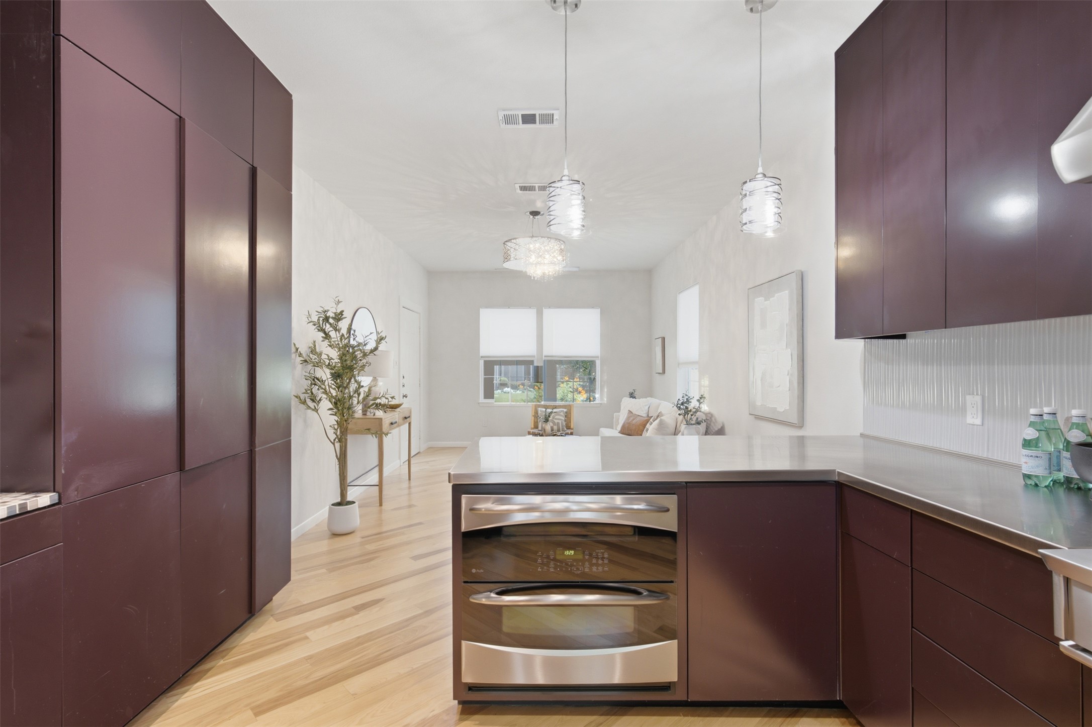 206 East 43rd Street Austin, TX 78751 - Photo 29 of 29 Open flow of the floor plan - this is the view from the kitchen towards the living area.