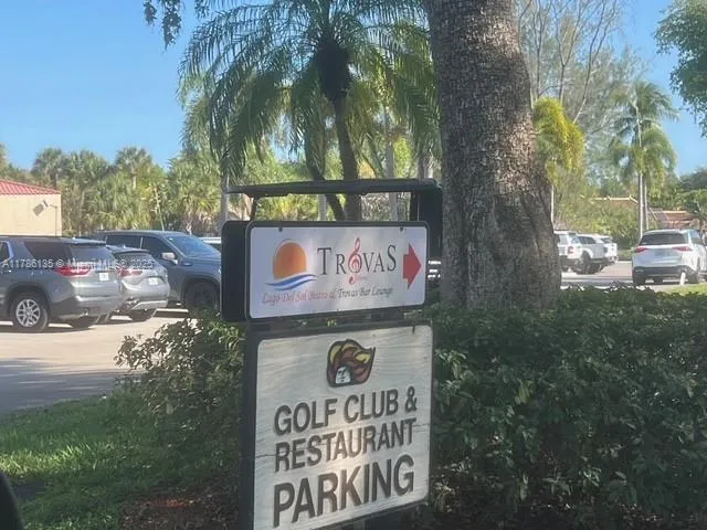 a view of lake with green space