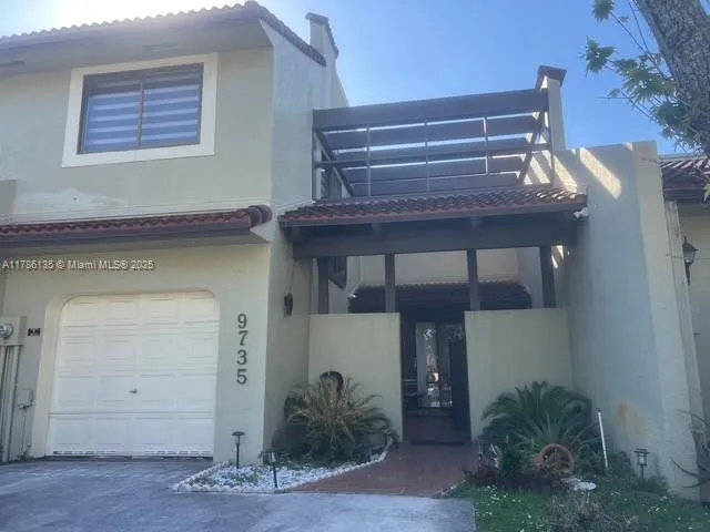 a view of an outdoor space with sitting space