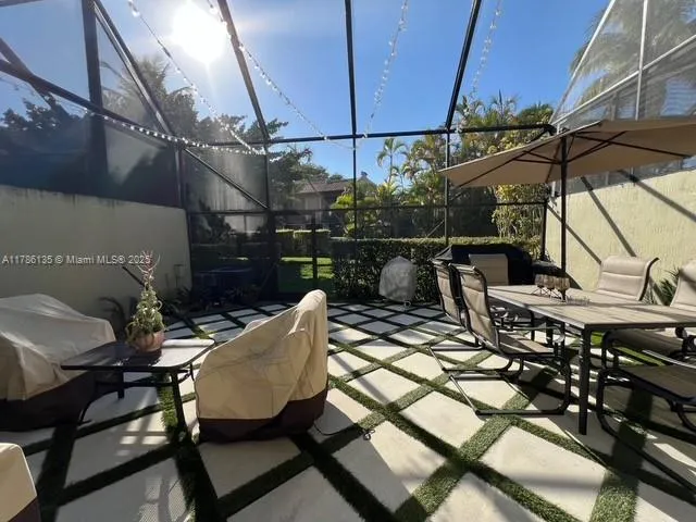 a kitchen with stainless steel appliances granite countertop a sink and a stove