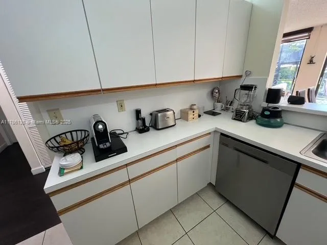 a bathroom with a sink toilet and mirror