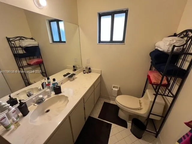 a view of a park with large trees