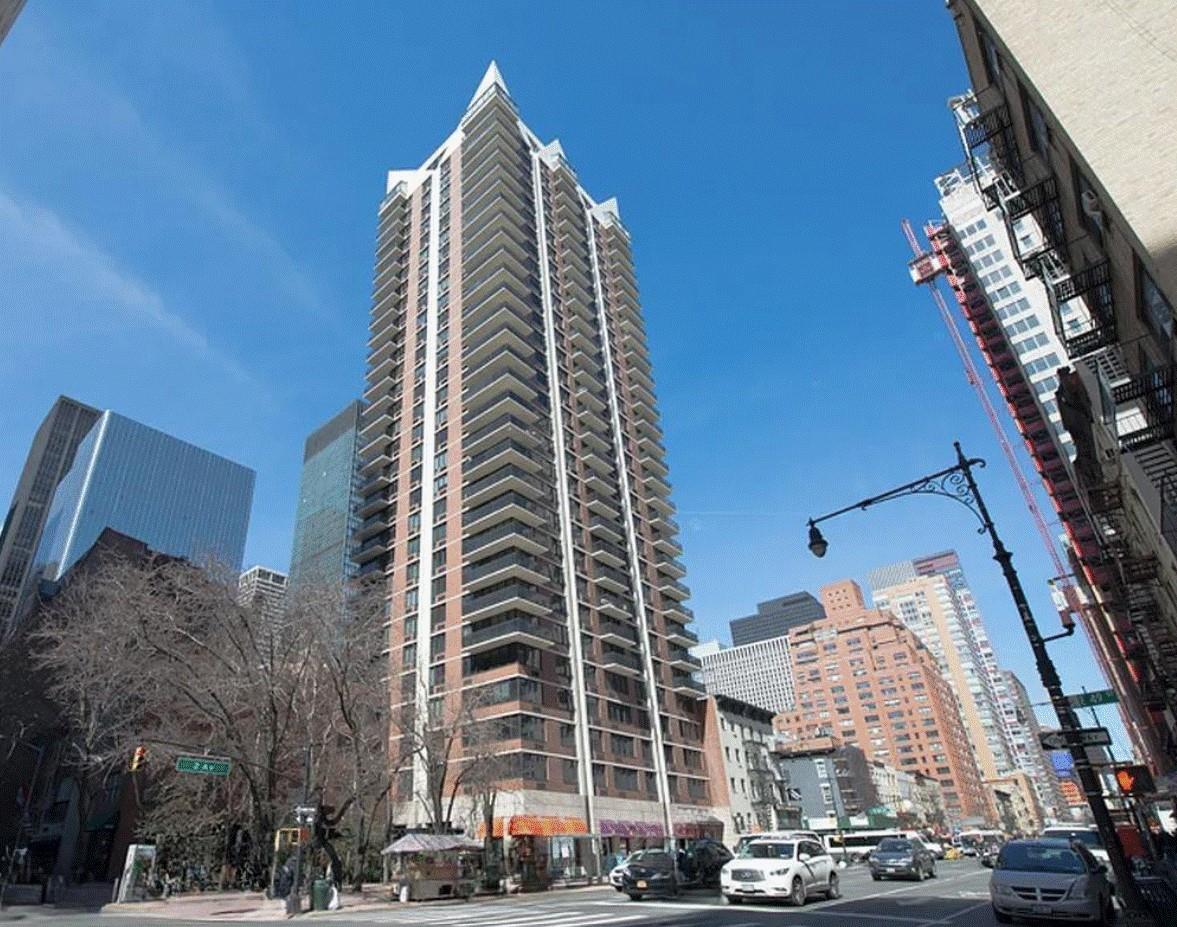 255 East 49th Street, Unit 31C Manhattan, NY 10017 - Photo 11 of 11 a view of a tall building