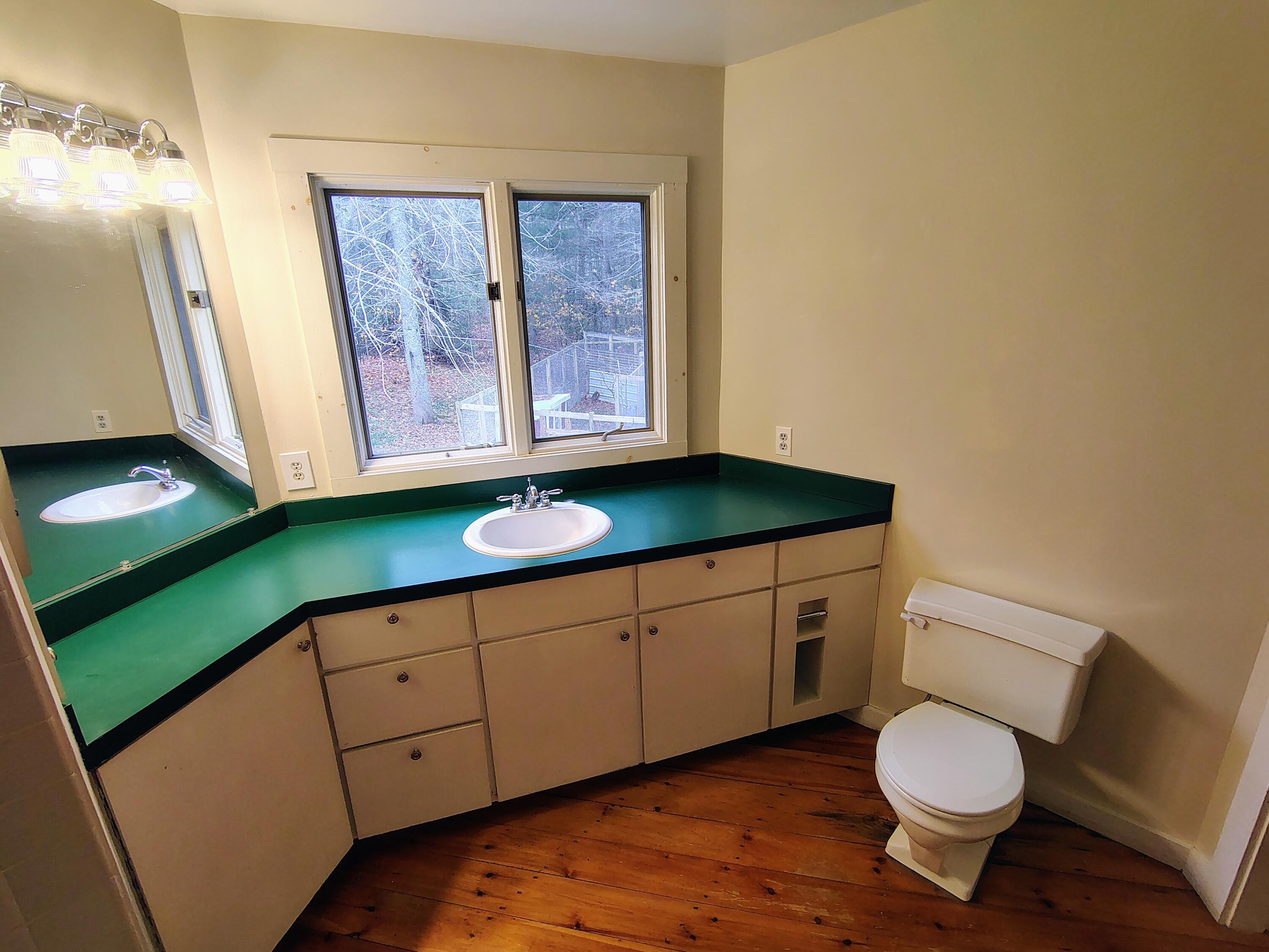 661 Herrick Road Sedgwick, ME 04673 - Photo 27 of 63 Primary Bedroom Vanity area