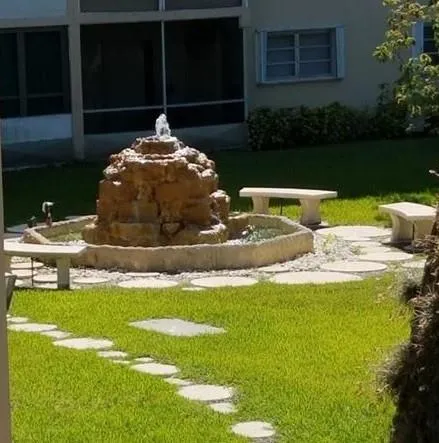 a swimming pool with wooden fence