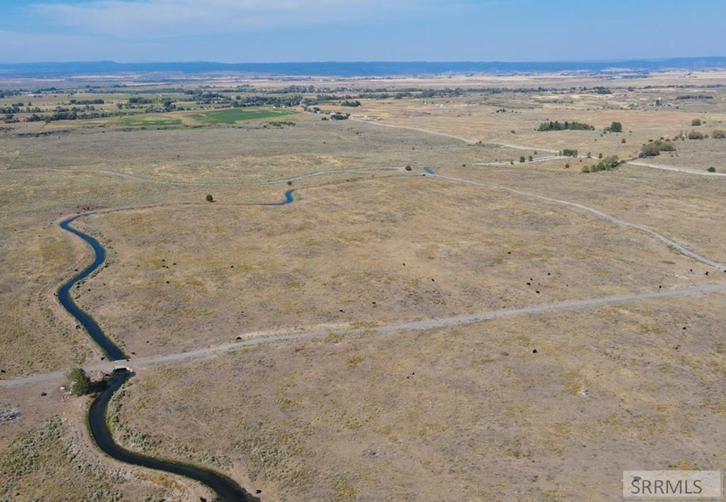 2990 Edgewater Lane St. Anthony, ID 83445 - Photo 9 of 39 Canal in summer with water