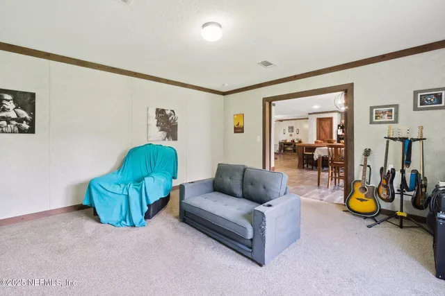 a living room with furniture and a couch