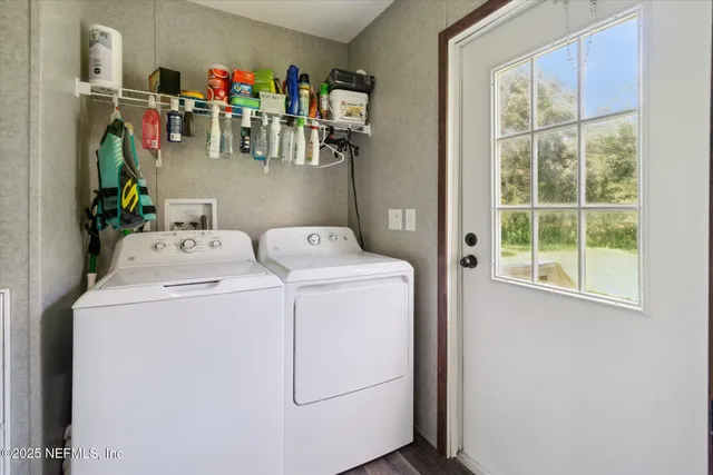 a utility room with dryer and washer