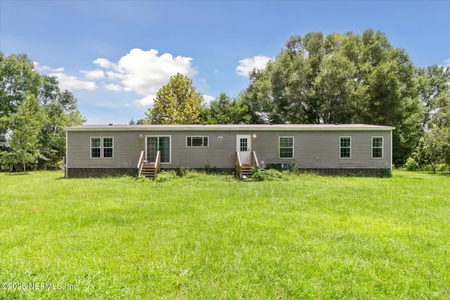 front view of a house and a yard