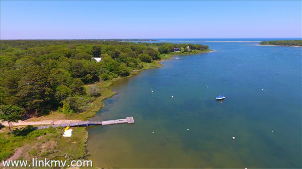4 Quail Run Road, Unit 14 Oak Bluffs, MA 02557 - Photo 26 of 29 Sengekontacket Saltwater Pond with access to kayak, paddleboard, swimming, fishing etc!