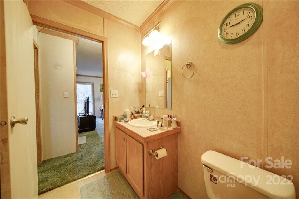 158 Smith Valley Road Sharon, SC 29742 - Photo 23 of 41 a bathroom with a sink a toilet and shower