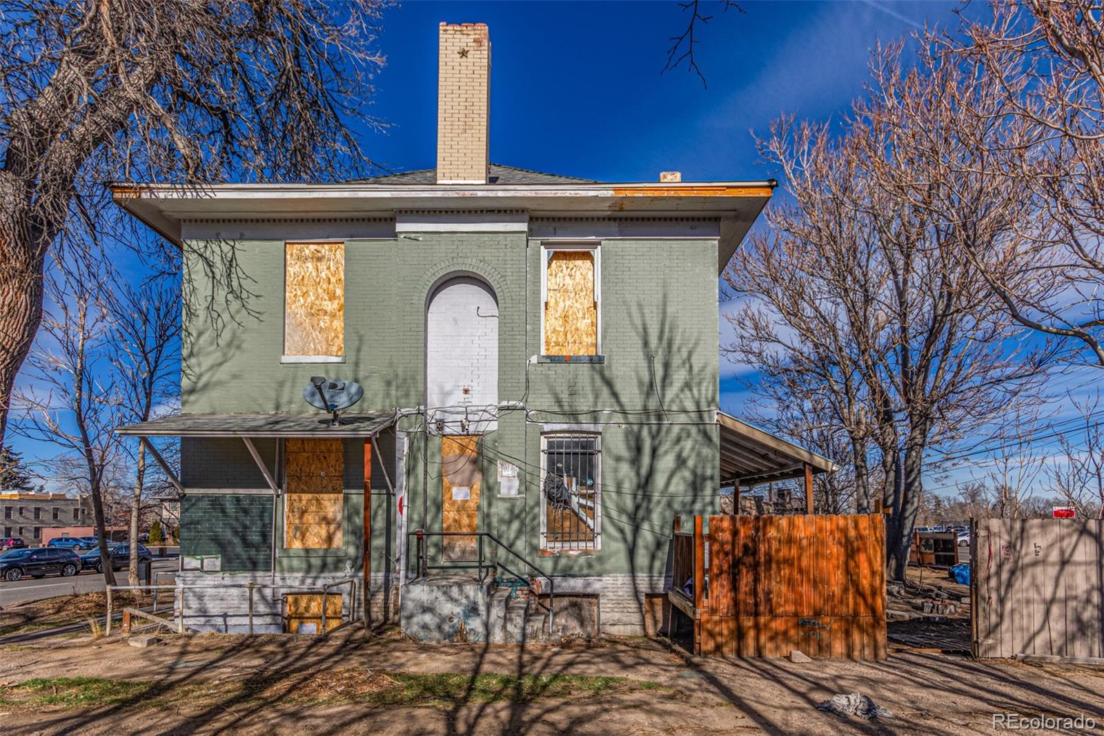 1632 York Street Denver, CO 80206 - Photo 6 of 13 a front view of a house with garden