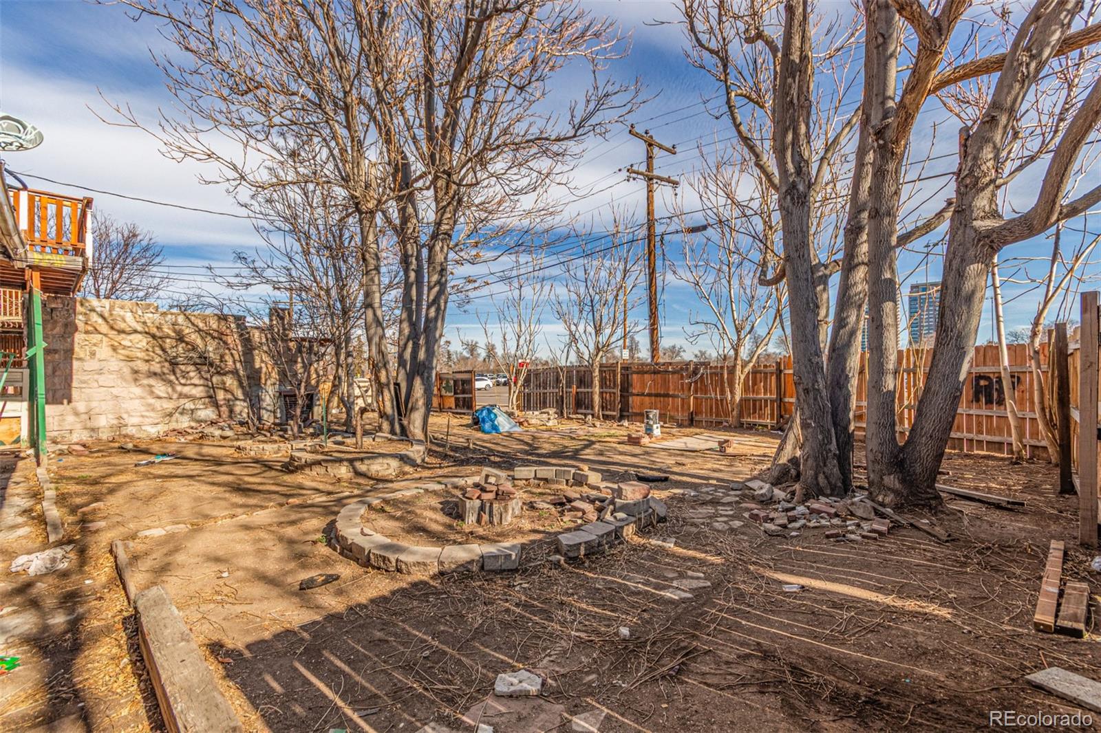 1632 York Street Denver, CO 80206 - Photo 9 of 13 a view of a yard with a house