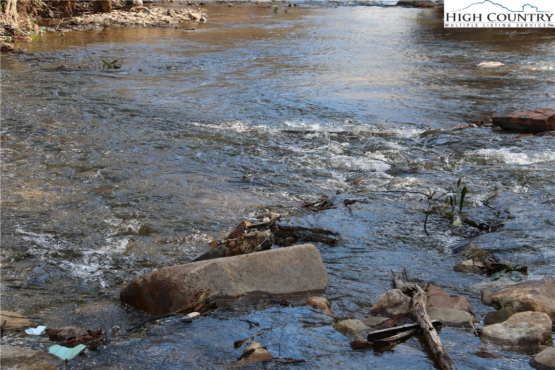 Big Laurel Road Creston, NC 28615 - Photo 24 of 27 a view of a backyard of the house