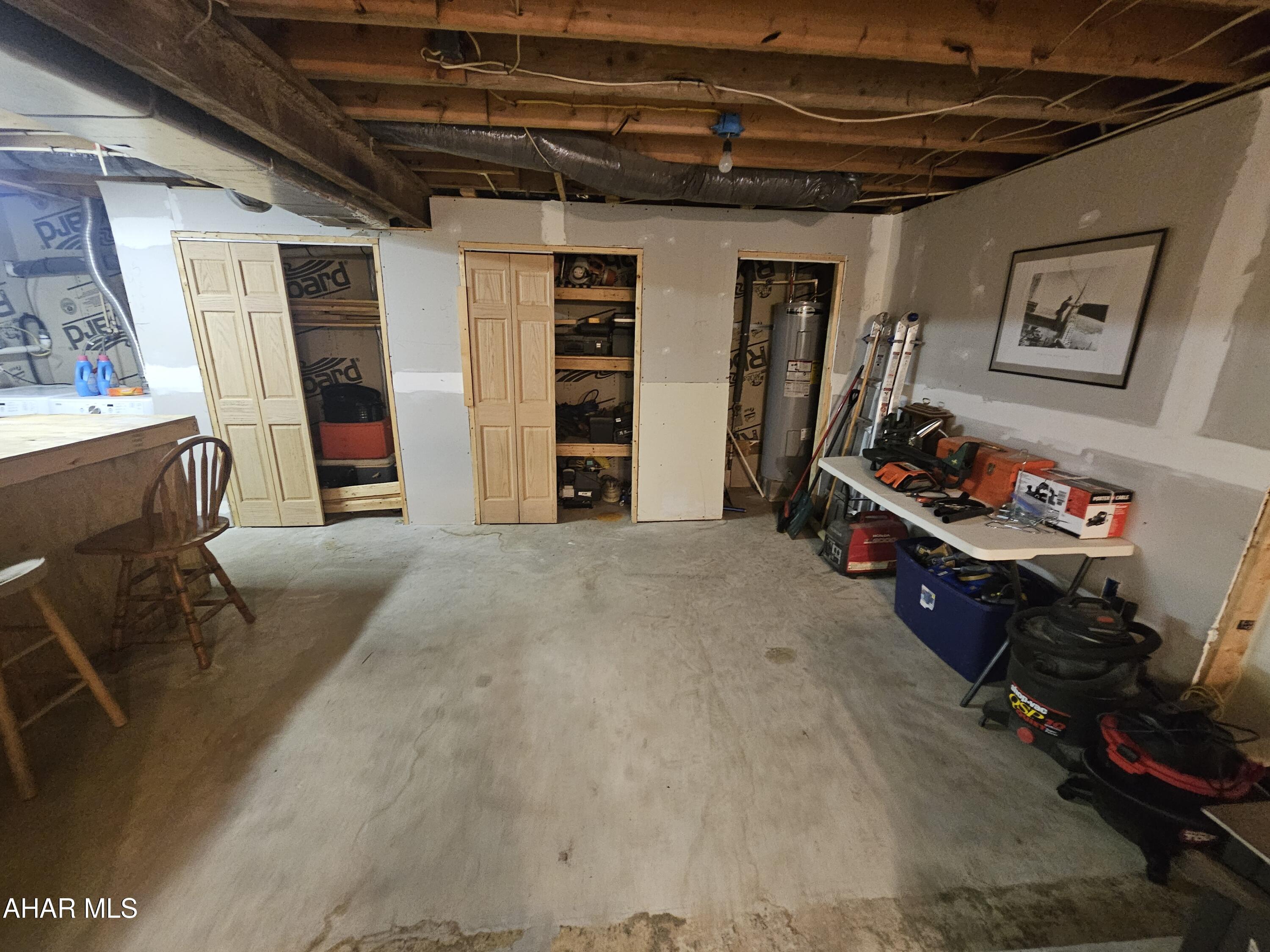 207 Kendrick Lane Flinton, PA 16640 - Photo 29 of 30 a bed room with a bed and a chair