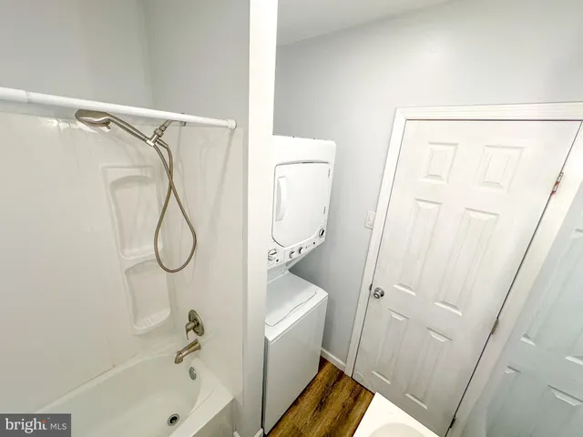 a bathroom with a bath tub and a shower