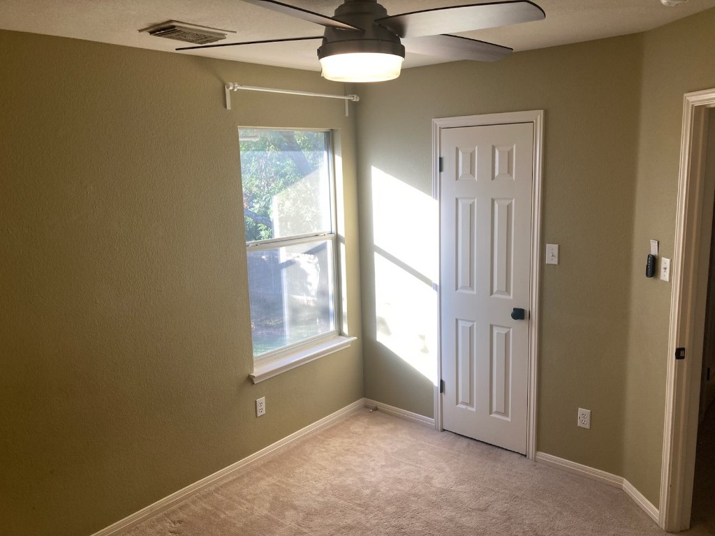 8116 Siringo Pass Austin, TX 78749 - Photo 5 of 9 a view of an empty room with a window