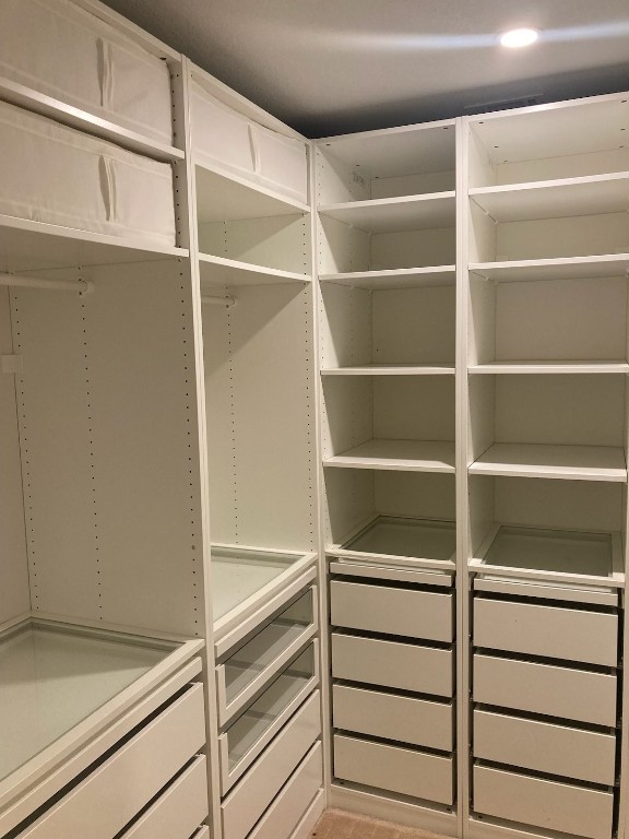 8116 Siringo Pass Austin, TX 78749 - Photo 7 of 9 a view of an empty walk in closet