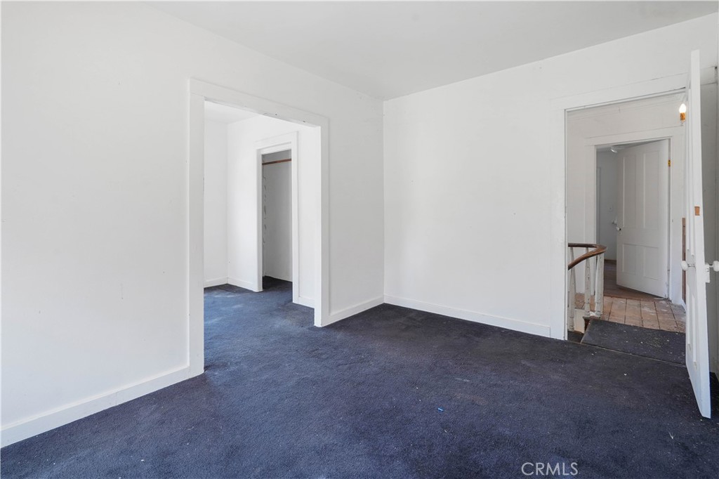 2010 Ladder Ridge Road Upper Lake, CA 95485 - Photo 12 of 75 an empty room with closet and a hallway
