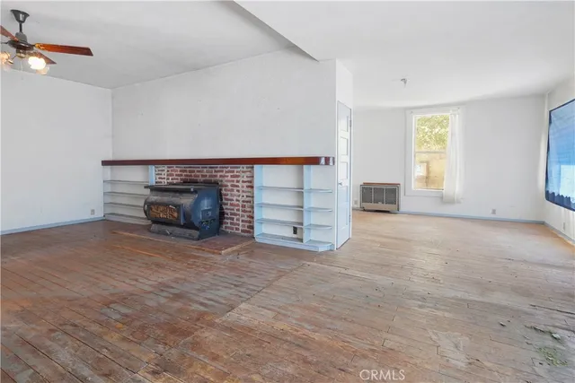 a kitchen with a stove and a microwave