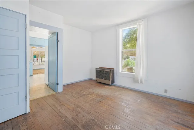 a kitchen with a sink and a window