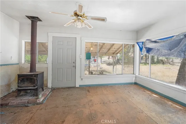 a roof deck with the table and chairs