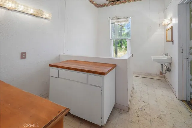 an aerial view of residential house with outdoor space