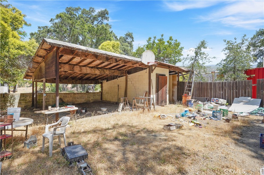 2010 Ladder Ridge Road Upper Lake, CA 95485 - Photo 37 of 75 a view of a chair and tables in the patio