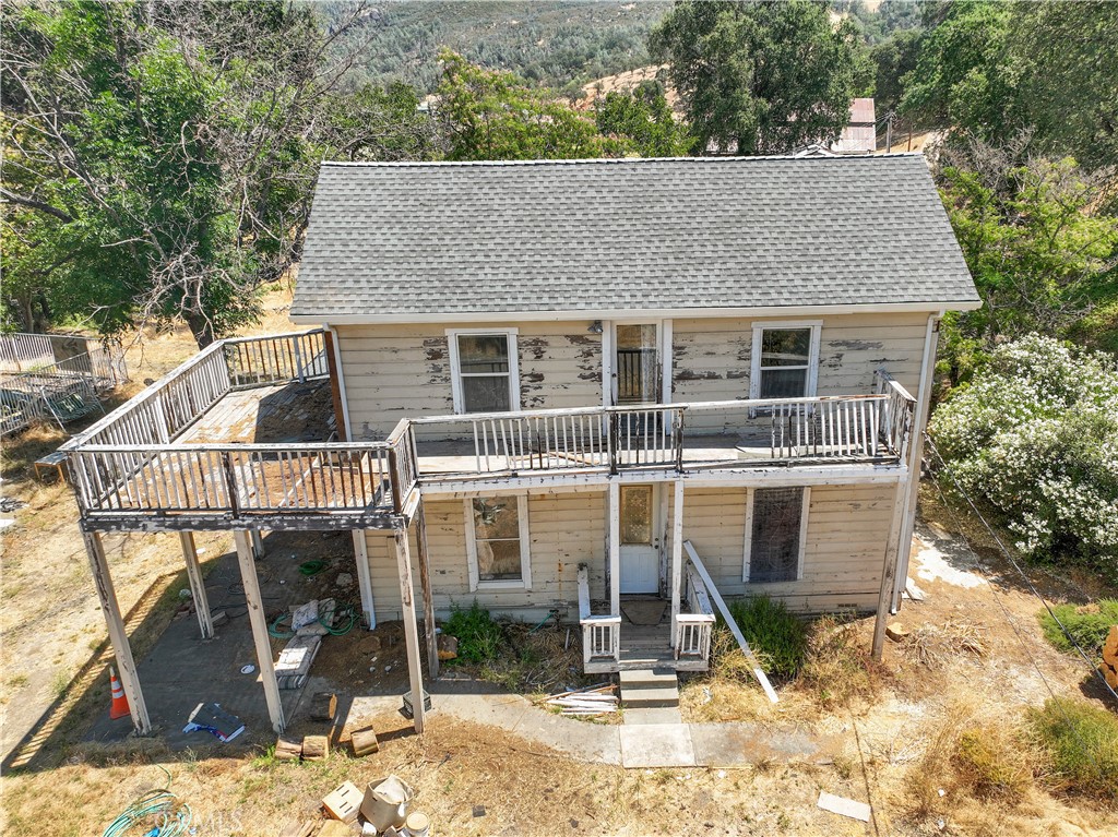 2010 Ladder Ridge Road Upper Lake, CA 95485 - Photo 43 of 75 a view of a house with backyard porch and sitting area