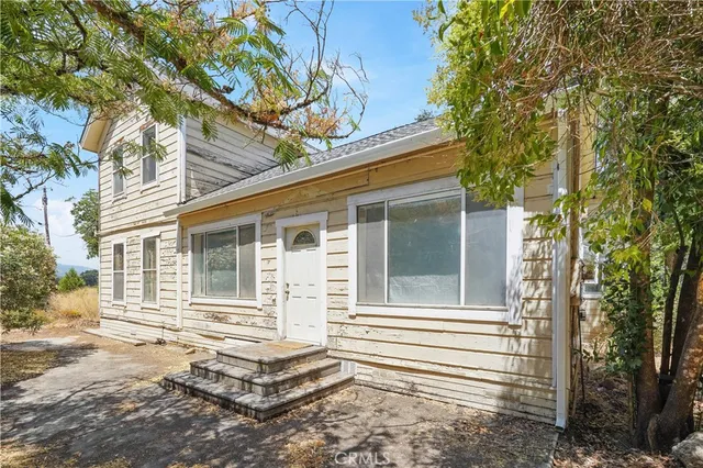 a view of swimming pool with patio
