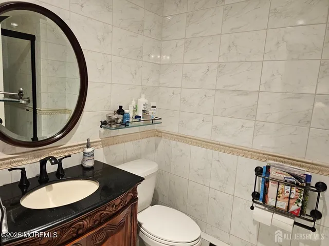 a bathroom with a toilet and a sink